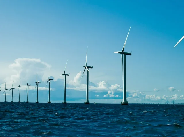 Offshore Wind Technology 2026 Massive 18MW offshore wind turbines with floating platforms in deep water installation, representing 2026 technology advancement