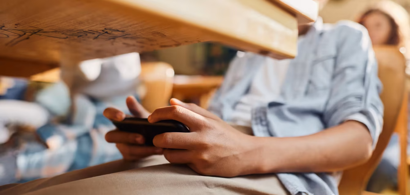 school-cell-phone-ban-by-state School cell phone ban by state 2026 map showing bell-to-bell, class-time and no-mandate states, Axis Intelligence Research Phone-Free School Index ranking of U.S. states with 41.6% of public school students under full-day phone bans in 2026
