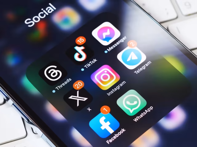 social-media-marketing-statistics-update Social media marketing statistics 2026 chart showing US social media ad revenue of 117.7 billion dollars passing search at 114.2 billion, Social media marketing budget share 2026 and Social Scam Loss Ratio trend 2020 to 2025, Axis Intelligence Research